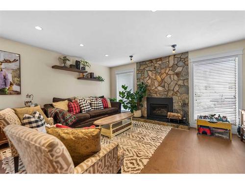 4058 46 Street Sw, Calgary, AB - Indoor Photo Showing Living Room With Fireplace