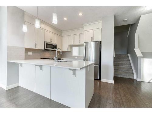 197 Silverado Plains Park Sw, Calgary, AB - Indoor Photo Showing Kitchen With Upgraded Kitchen