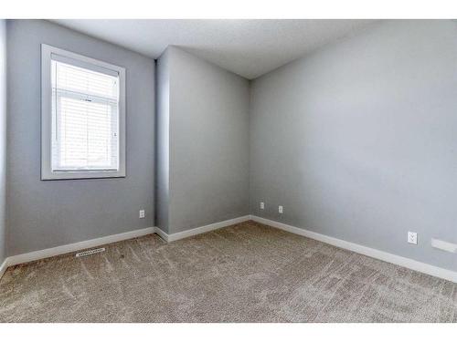 197 Silverado Plains Park Sw, Calgary, AB - Indoor Photo Showing Other Room