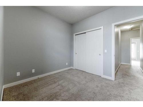 197 Silverado Plains Park Sw, Calgary, AB - Indoor Photo Showing Other Room