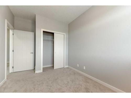 197 Silverado Plains Park Sw, Calgary, AB - Indoor Photo Showing Other Room