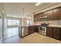 3304-4 Kingsland Close Se, Airdrie, AB  - Indoor Photo Showing Kitchen With Stainless Steel Kitchen 