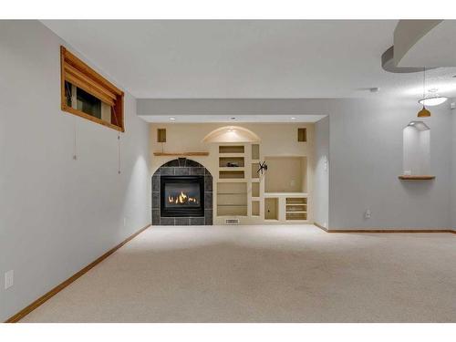 81 Arbour Crest Circle Nw, Calgary, AB - Indoor With Fireplace