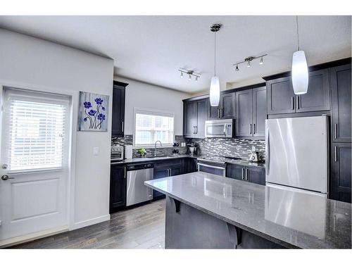 103 Evansridge Court Nw, Calgary, AB - Indoor Photo Showing Kitchen With Stainless Steel Kitchen With Upgraded Kitchen