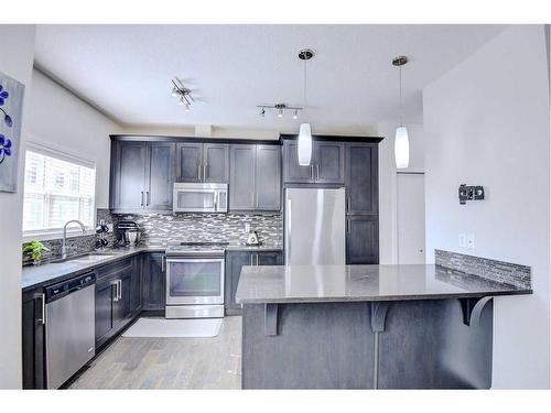 103 Evansridge Court Nw, Calgary, AB - Indoor Photo Showing Kitchen With Stainless Steel Kitchen With Upgraded Kitchen