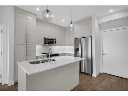 2414-395 Skyview Parkway Ne, Calgary, AB - Indoor Photo Showing Kitchen With Double Sink With Upgraded Kitchen