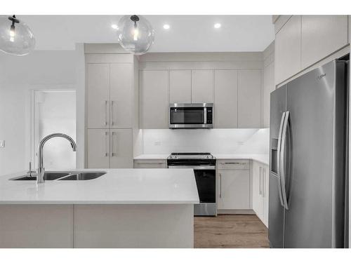 2414-395 Skyview Parkway Ne, Calgary, AB - Indoor Photo Showing Kitchen With Double Sink With Upgraded Kitchen