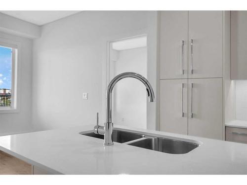 2414-395 Skyview Parkway Ne, Calgary, AB - Indoor Photo Showing Kitchen With Double Sink