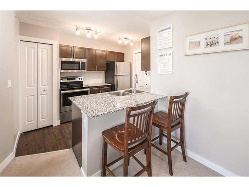 405-10 Kincora Glen Park Nw, Calgary, AB - Indoor Photo Showing Kitchen With Stainless Steel Kitchen With Double Sink