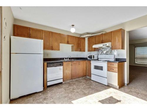 103-Taradale Drive Ne, Calgary, AB - Indoor Photo Showing Kitchen