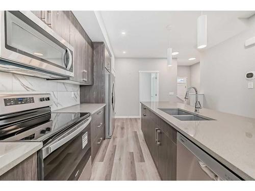 1108 Mahogany Boulevard Se, Calgary, AB - Indoor Photo Showing Kitchen With Stainless Steel Kitchen With Double Sink With Upgraded Kitchen