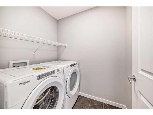 1108 Mahogany Boulevard Se, Calgary, AB - Indoor Photo Showing Laundry Room