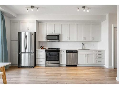 405-300 Auburn Meadows Common Se, Calgary, AB - Indoor Photo Showing Kitchen