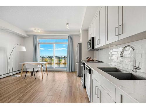 405-300 Auburn Meadows Common Se, Calgary, AB - Indoor Photo Showing Kitchen With Double Sink With Upgraded Kitchen