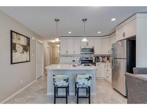 61 Chaparral Valley Gardens Se, Calgary, AB - Indoor Photo Showing Kitchen With Upgraded Kitchen