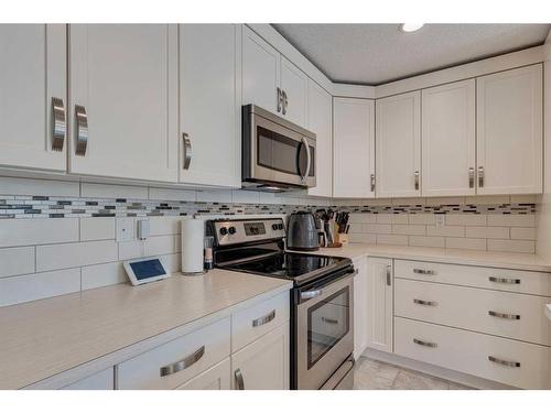 61 Chaparral Valley Gardens Se, Calgary, AB - Indoor Photo Showing Kitchen