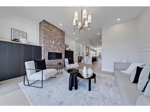 2418 32 Street Sw, Calgary, AB - Indoor Photo Showing Living Room With Fireplace