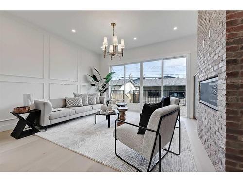 2418 32 Street Sw, Calgary, AB - Indoor Photo Showing Living Room With Fireplace