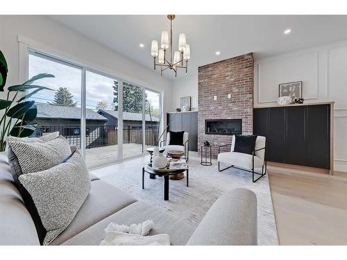 2418 32 Street Sw, Calgary, AB - Indoor Photo Showing Living Room With Fireplace