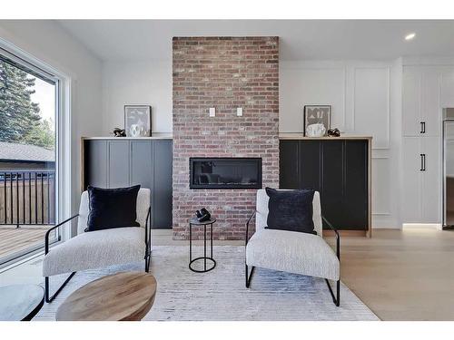 2418 32 Street Sw, Calgary, AB - Indoor Photo Showing Living Room With Fireplace