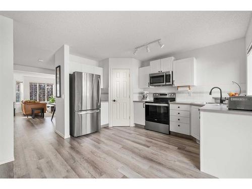 106 Bridlewood Avenue Sw, Calgary, AB - Indoor Photo Showing Kitchen