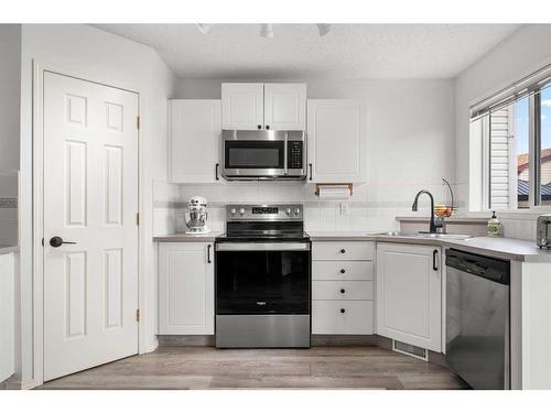 106 Bridlewood Avenue Sw, Calgary, AB - Indoor Photo Showing Kitchen