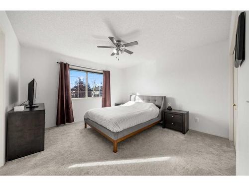 106 Bridlewood Avenue Sw, Calgary, AB - Indoor Photo Showing Bedroom