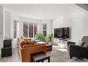 106 Bridlewood Avenue Sw, Calgary, AB  - Indoor Photo Showing Living Room 