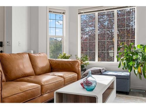 106 Bridlewood Avenue Sw, Calgary, AB - Indoor Photo Showing Living Room