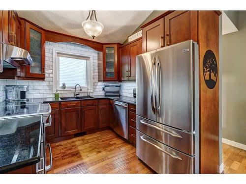 48 Hidden Spring Place Nw, Calgary, AB - Indoor Photo Showing Kitchen