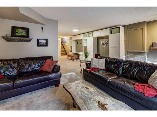 48 Hidden Spring Place Nw, Calgary, AB - Indoor Photo Showing Living Room