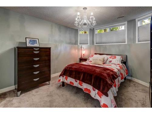 48 Hidden Spring Place Nw, Calgary, AB - Indoor Photo Showing Bedroom