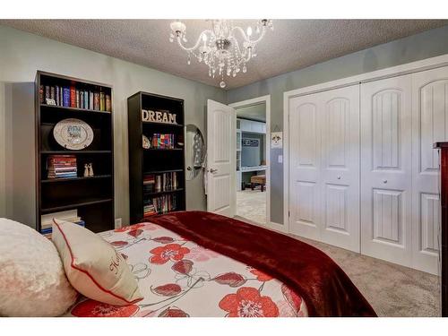 48 Hidden Spring Place Nw, Calgary, AB - Indoor Photo Showing Bedroom