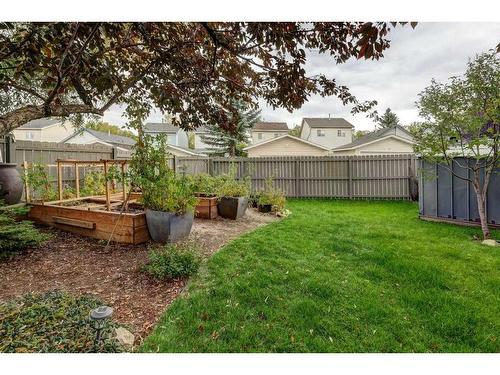 48 Hidden Spring Place Nw, Calgary, AB - Outdoor With Deck Patio Veranda With Backyard