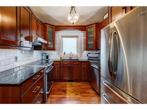 48 Hidden Spring Place Nw, Calgary, AB - Indoor Photo Showing Kitchen