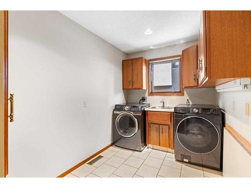 239 East Chestermere Drive, Chestermere, AB - Indoor Photo Showing Laundry Room