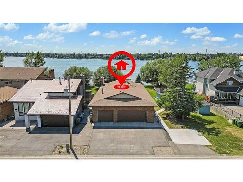 239 East Chestermere Drive, Chestermere, AB - Outdoor With Body Of Water With Deck Patio Veranda