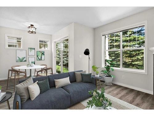 19-2318 17 Street Se, Calgary, AB - Indoor Photo Showing Living Room