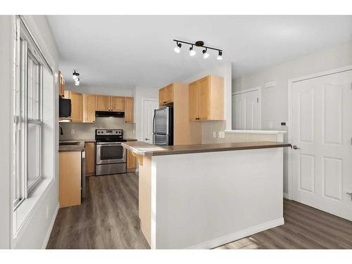 19-2318 17 Street Se, Calgary, AB - Indoor Photo Showing Kitchen With Stainless Steel Kitchen