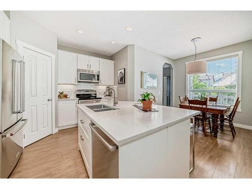 95 Elgin Drive Se, Calgary, AB - Indoor Photo Showing Kitchen With Double Sink