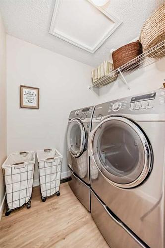 95 Elgin Drive Se, Calgary, AB - Indoor Photo Showing Laundry Room