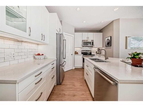 95 Elgin Drive Se, Calgary, AB - Indoor Photo Showing Kitchen With Double Sink With Upgraded Kitchen