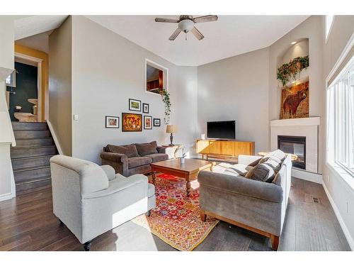 66 Inglewood Grove Se, Calgary, AB - Indoor Photo Showing Living Room With Fireplace