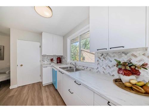 3420 Button Road Nw, Calgary, AB - Indoor Photo Showing Kitchen With Double Sink