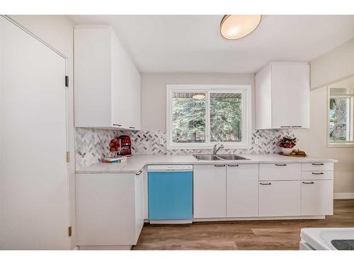 3420 Button Road Nw, Calgary, AB - Indoor Photo Showing Kitchen With Double Sink