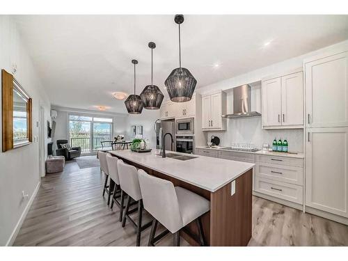 112-30 Sage Hill Walk Nw, Calgary, AB - Indoor Photo Showing Kitchen With Double Sink With Upgraded Kitchen