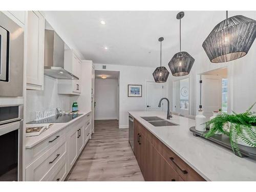 112-30 Sage Hill Walk Nw, Calgary, AB - Indoor Photo Showing Kitchen With Double Sink With Upgraded Kitchen