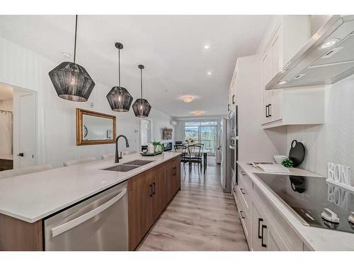 112-30 Sage Hill Walk Nw, Calgary, AB - Indoor Photo Showing Kitchen With Double Sink With Upgraded Kitchen