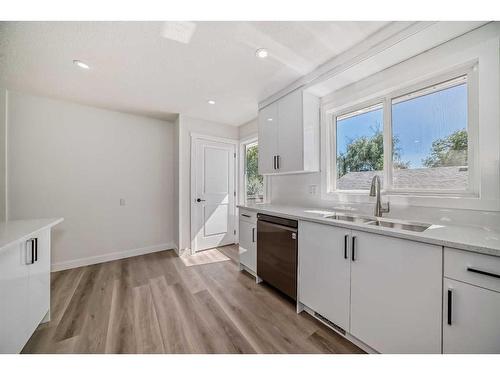 203 Rundleside Crescent Ne, Calgary, AB - Indoor Photo Showing Kitchen With Double Sink