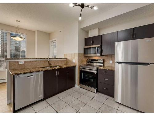 1415-1053 10 Street Sw, Calgary, AB - Indoor Photo Showing Kitchen With Stainless Steel Kitchen